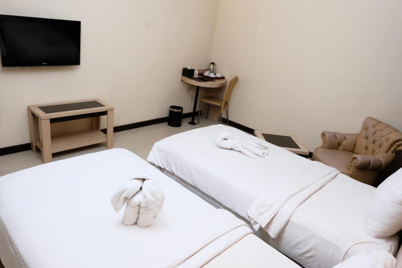 Rio City Hotel Palembang Exterior photo