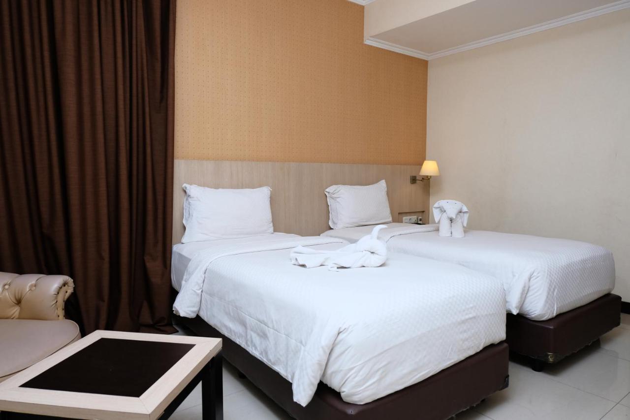 Rio City Hotel Palembang Exterior photo