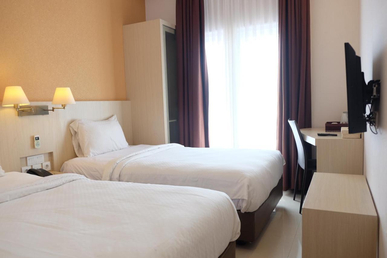 Rio City Hotel Palembang Exterior photo