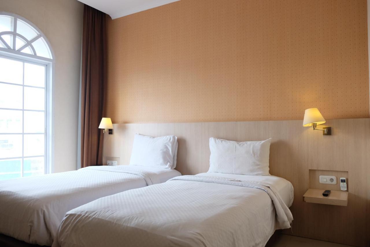 Rio City Hotel Palembang Exterior photo