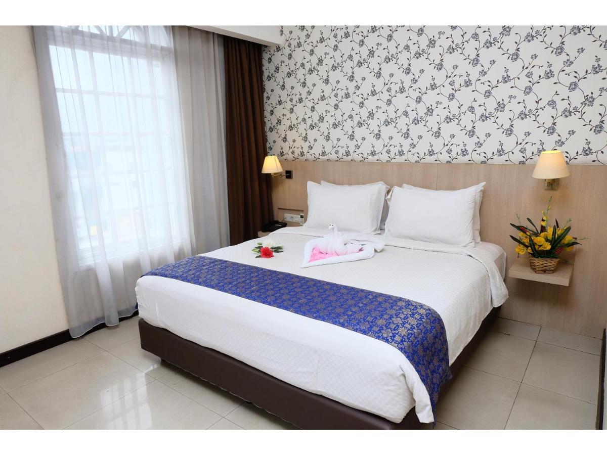 Rio City Hotel Palembang Exterior photo